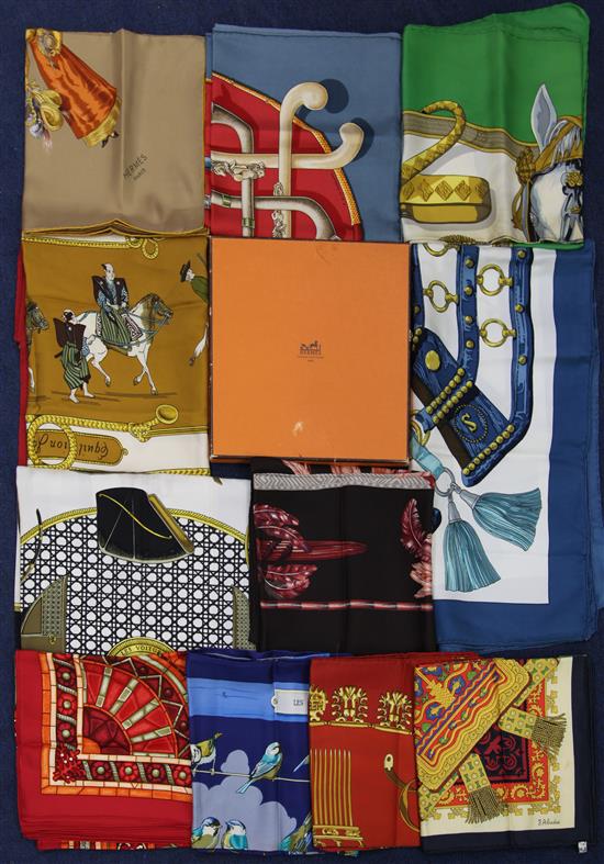 A collection of twelve Hermes silk scarves and one Hermes box,